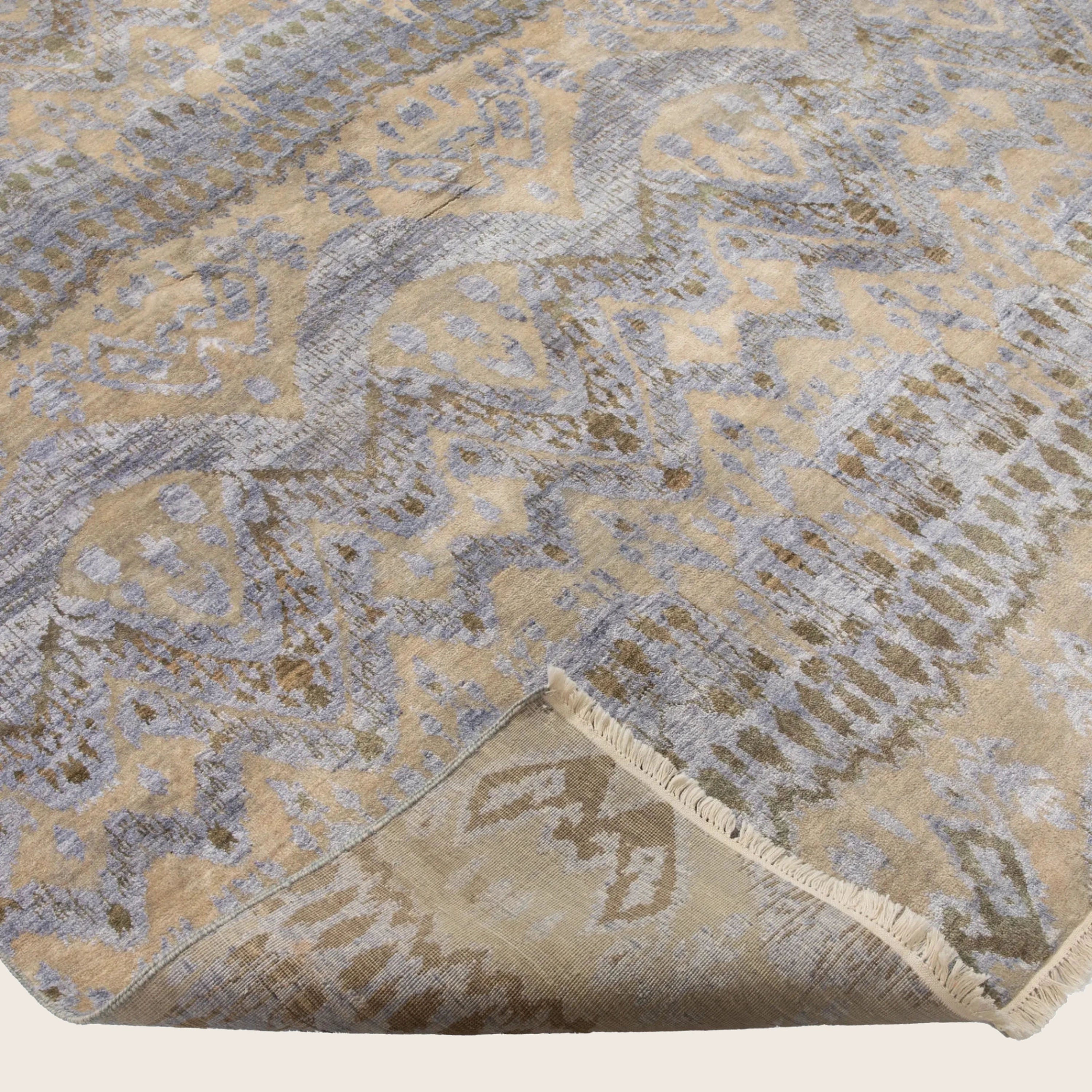 Mehrfarbiger Übergangs-Indo Ikat Teppich aus Wolle und Kunstseide - 8'1 x 12'5'