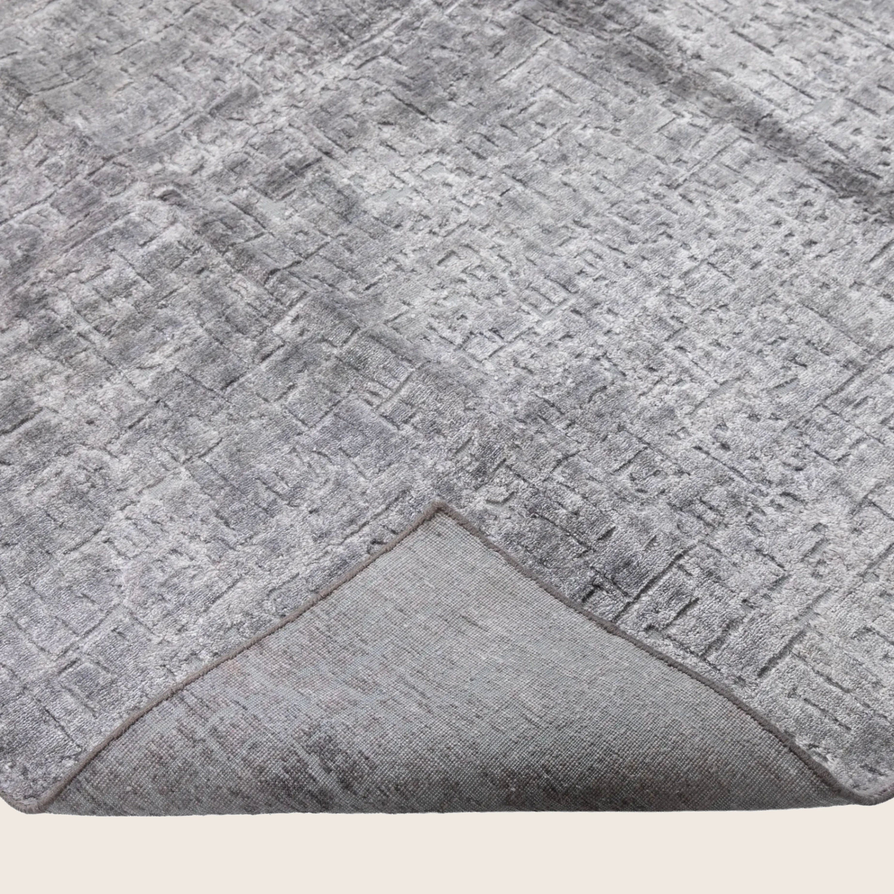 Silber Texturierte Indo Ikat Teppich aus Wolle und Kunstseide - 7'8' x 10'1'